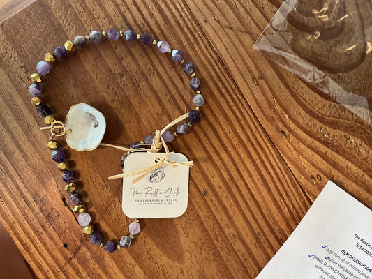 PURPLE/GOLD NECKLACE W OYSTER